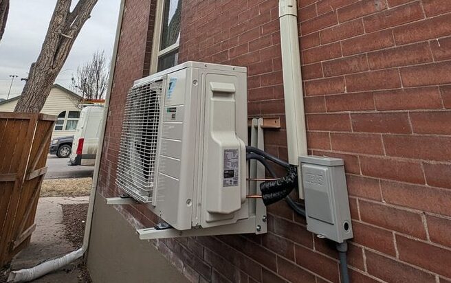 A Daikin Wall mounted outdoor condenser for the heat-pump rebate program